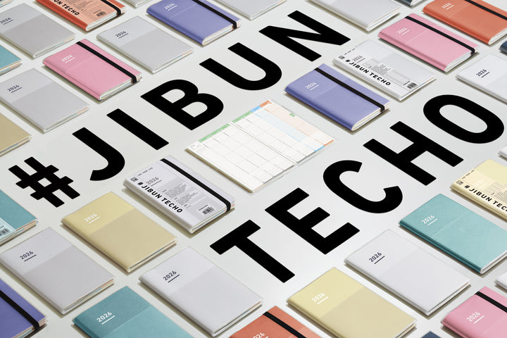 A Kokuyo Jibun Techo First Kit 2025 B6 Mini Slim, featuring a sleek matte PVC cover with a built-in pen holder. Includes DIARY, LIFE, and IDEA booklets for complete planning and self-discovery.