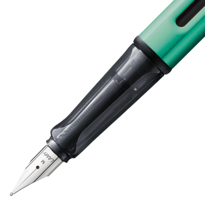Lamy AL-Star fountain pen in Bluegreen, close-up of the steel nib and grip section