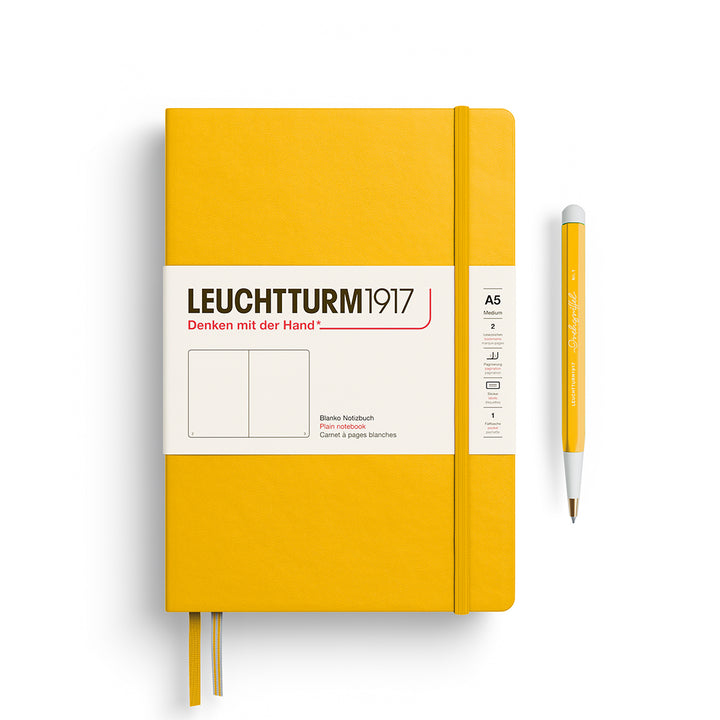 Leuchtturm1917 A5 Medium Hardcover Notebook in Sunflower yellow with plain pages for journaling and drawing.