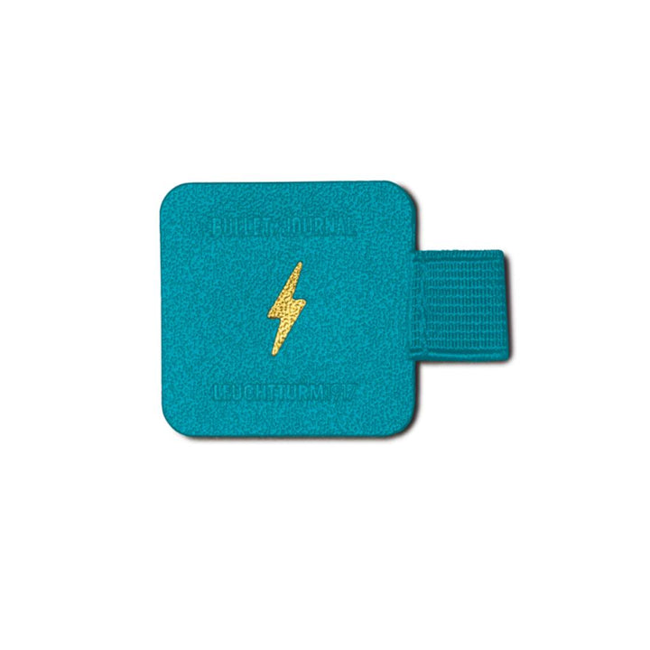 Leuchtturm1917 Pen Loop in Turquoise25 with elastic band and embossed lightning bolt—perfect for securely attaching pens to your Bullet Journal.