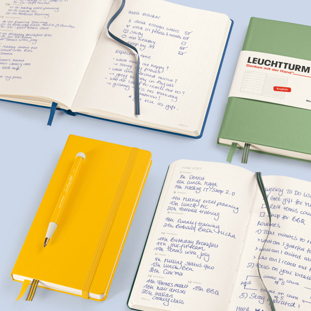 Leuchtturm1917 Weekly Planner &amp; Notebook 2027 – open planners with handwritten entries