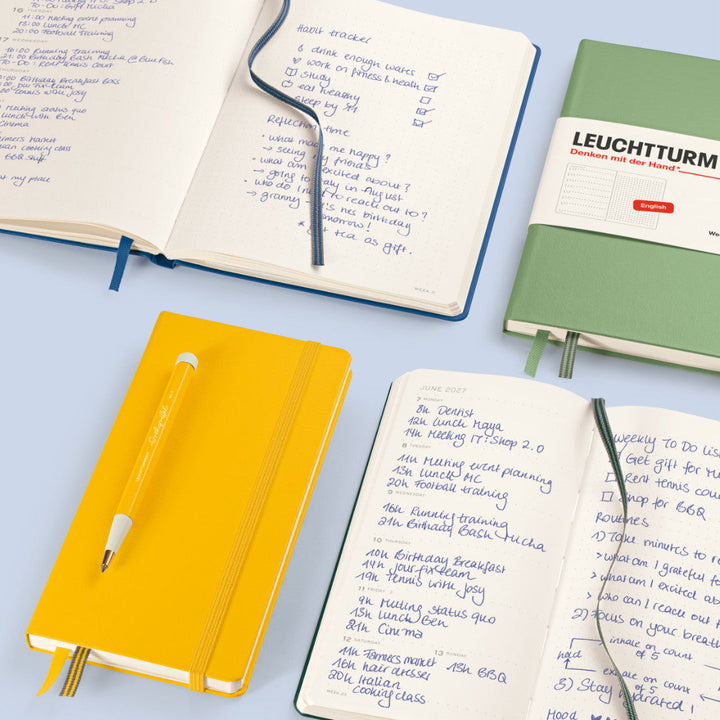 Leuchtturm1917 Weekly Planner &amp; Notebook 2027 – open planners with handwritten entries