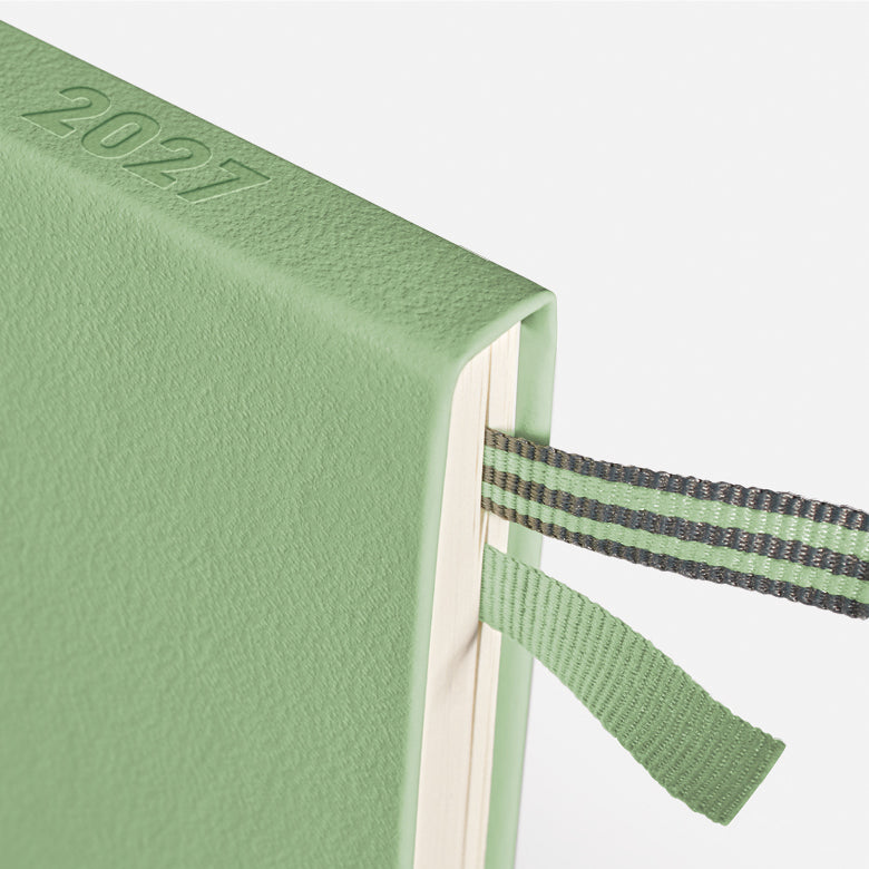 Leuchtturm1917 Weekly Planner &amp; Notebook 2027 in Sage – close-up of embossed 2027 cover and ribbon bookmark