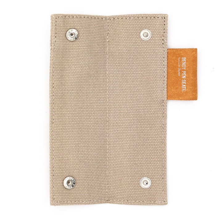 Luddite Canvas×MAYA Bendy Pen Sheath 2+1 - Beige — writing at an angle