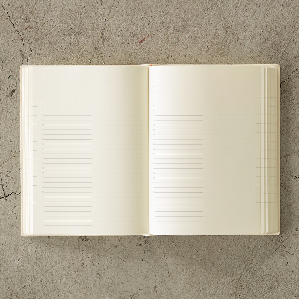 MD Notebook Diary (A5) 1 Day 1 Page 2026 with a minimalist PVC cover, year-stamped spine, and index tabs for each month. The diary is open to show a clean daily page layout on premium MD PAPER, ideal for journaling or planning.