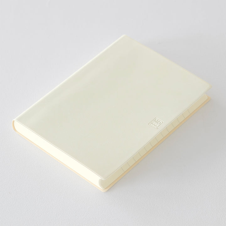 MD Notebook Diary (A5) 1 Day 1 Page 2026 with a minimalist PVC cover, year-stamped spine, and index tabs for each month. The diary is open to show a clean daily page layout on premium MD PAPER, ideal for journaling or planning.