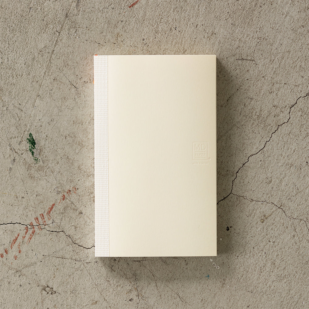 Featuring monthly, weekly, and plain memo pages, this minimalist diary is made with MD PAPER for an exceptional writing experience and flat-opening durability—perfect for planners who value both function and creativity.