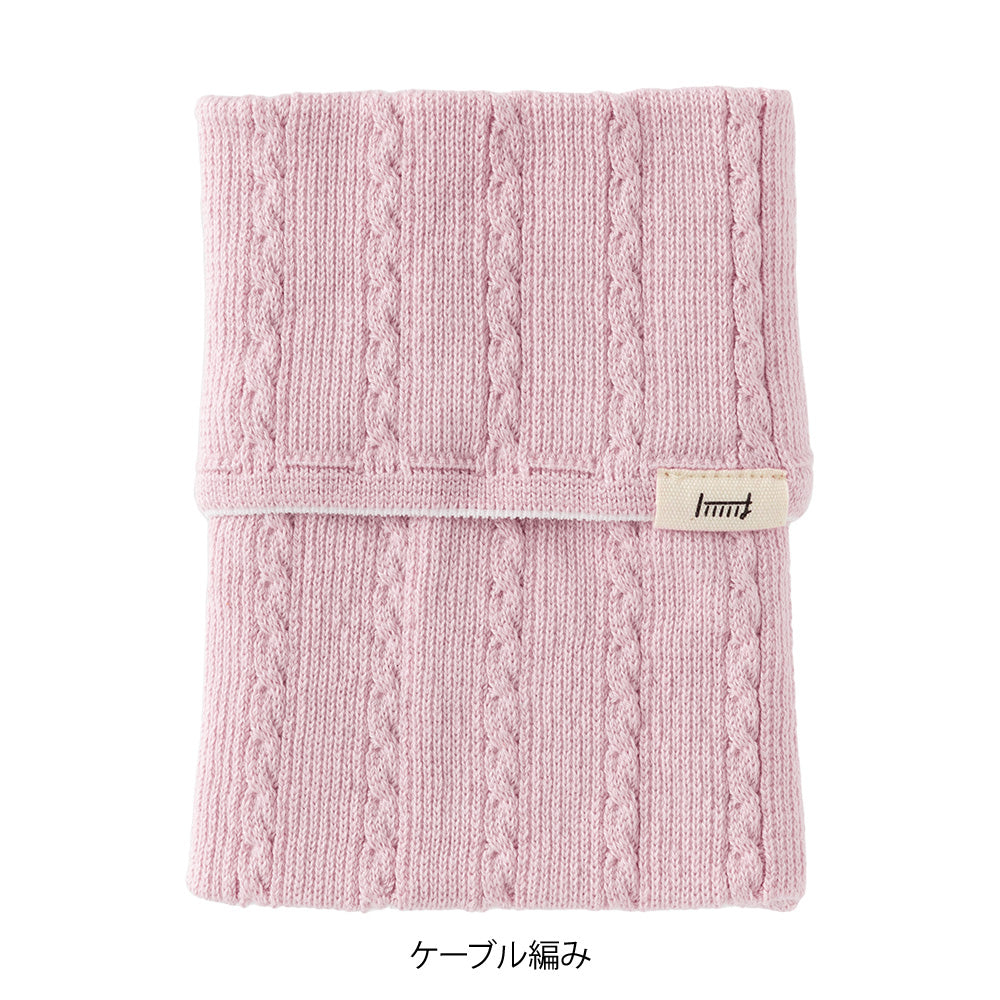 Midori Notebook’s HARAMAKI A6～B6 in Baby Pink, shown in packaging. A soft cable-knit pouch with flap cover, designed to wrap around a planner like a belly warmer, with stretchable pockets for pens and small essentials.