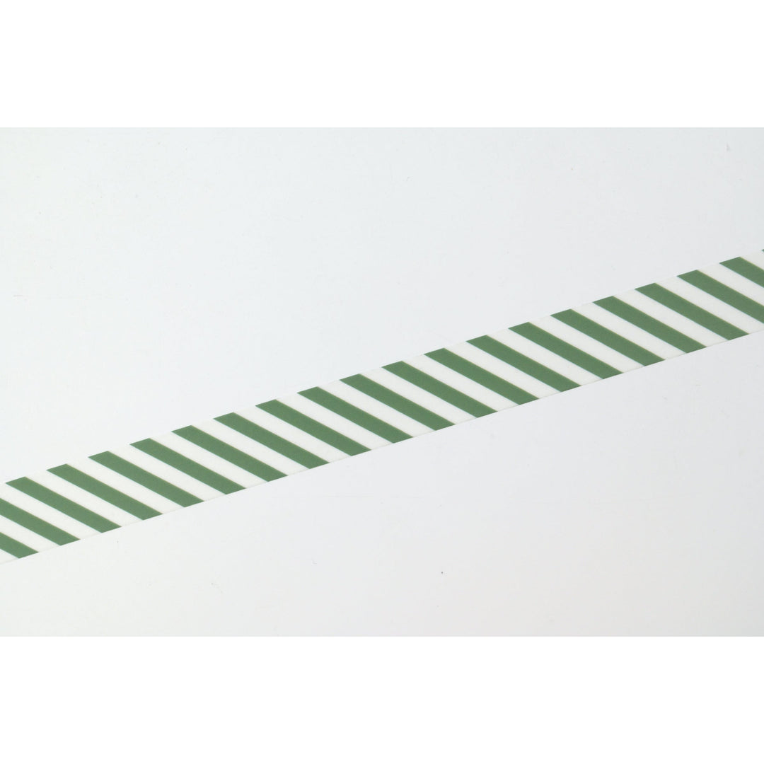 MT 1P Stripe washi tape in Deep Green applied as a diagonal strip, close-up of the stripe pattern