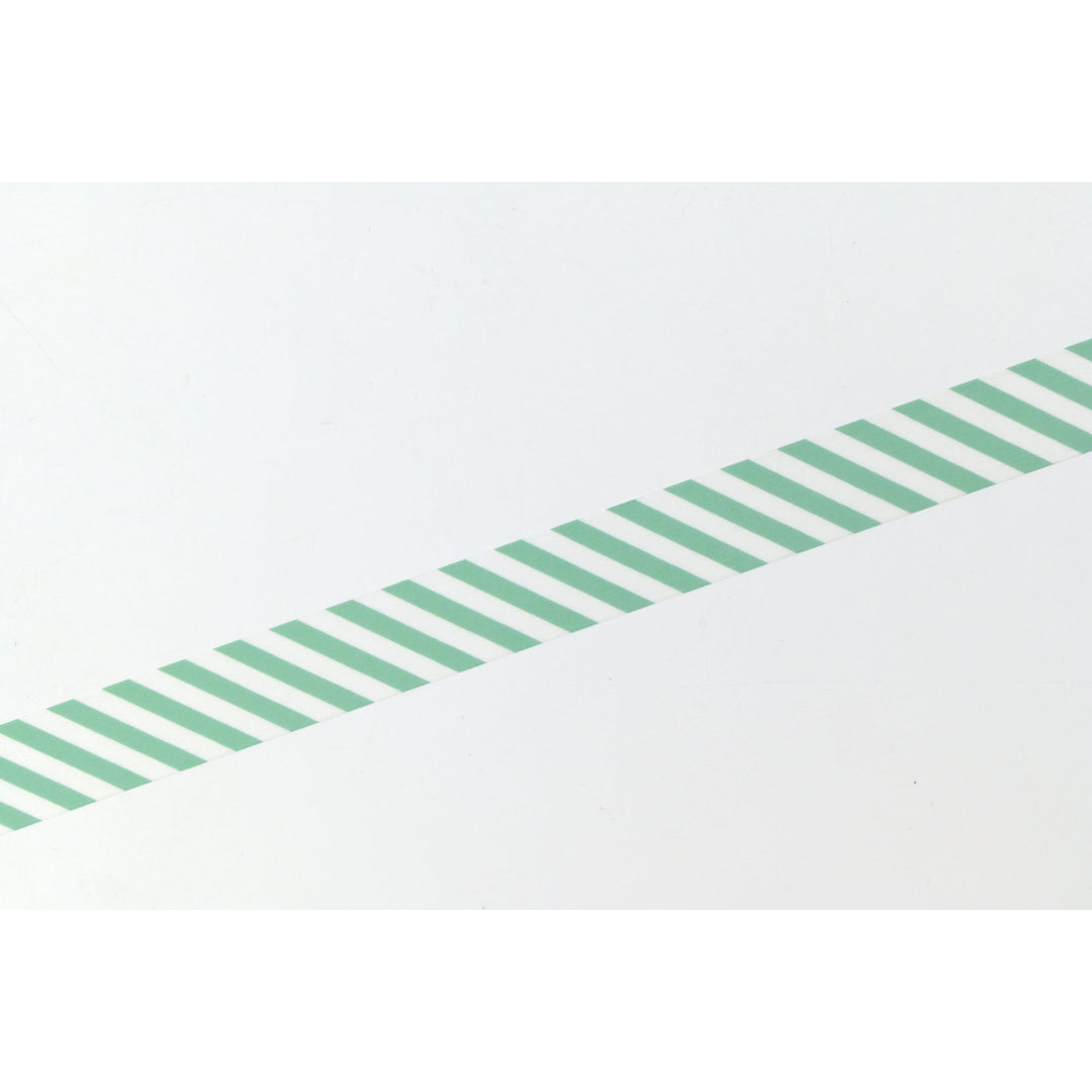 MT 1P Stripe washi tape in Emerald Green applied as a diagonal strip, close-up of the stripe pattern
