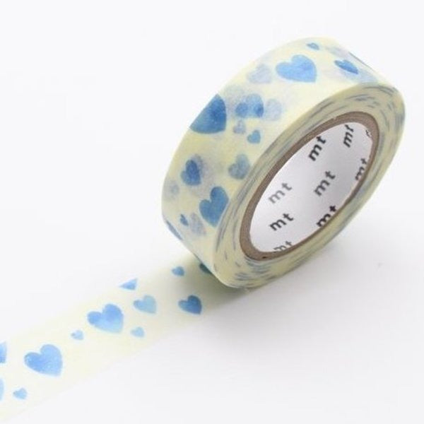 MT Deco Heart Stamp Blue washi tape, close-up of the roll with blue stamped hearts
