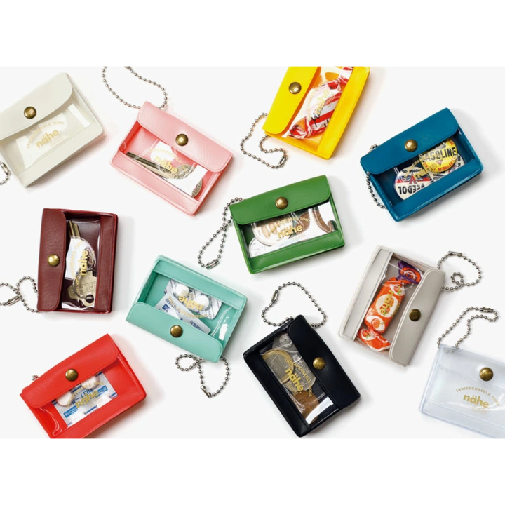 nähe General Purpose Case Mini in blue, palm-sized storage case with clear window, back pocket, and ball chain for carrying small items.