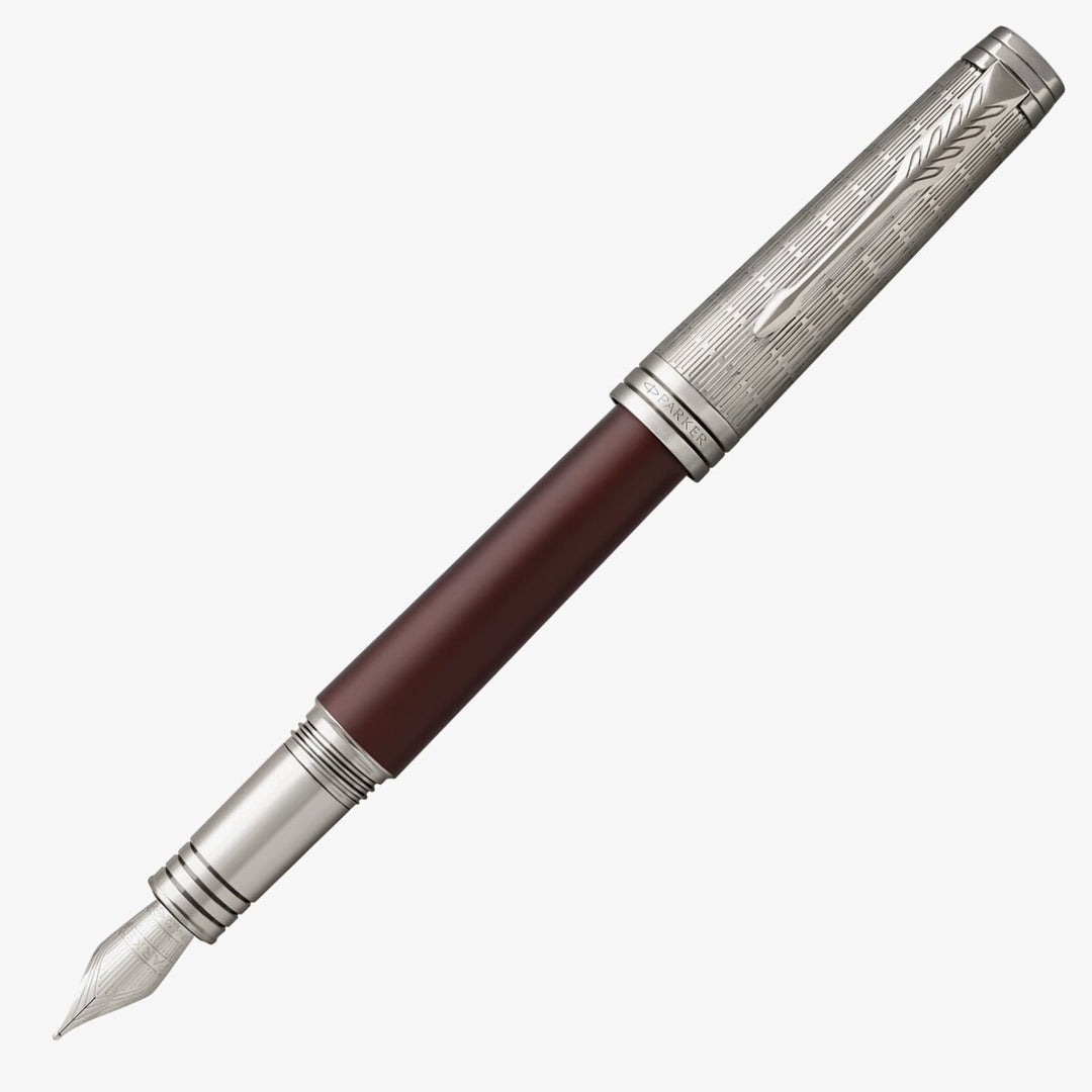 Parker Premier Custom Crimson Red fountain pen with ruthenium trim, capped, shown at an angle