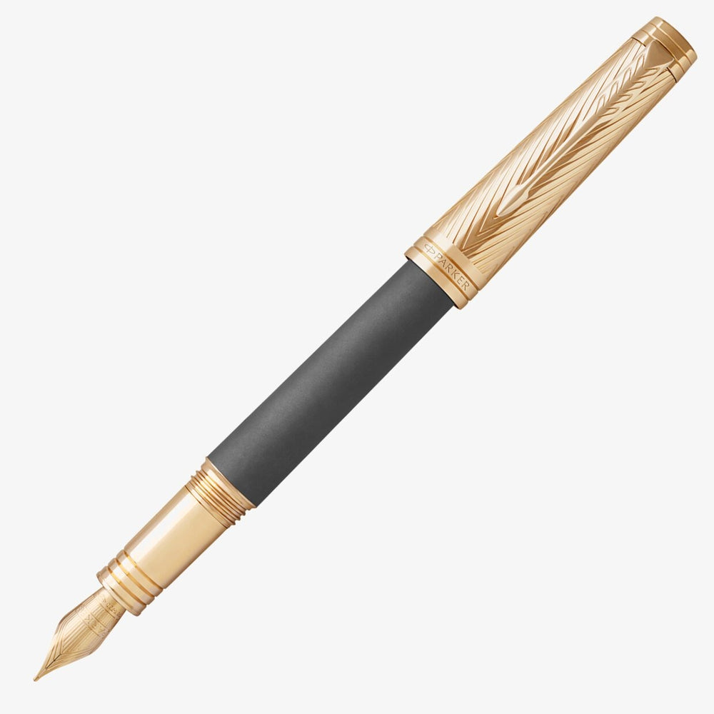 Parker Premier Custom Storm Grey fountain pen with gold trim, capped, shown at an angle