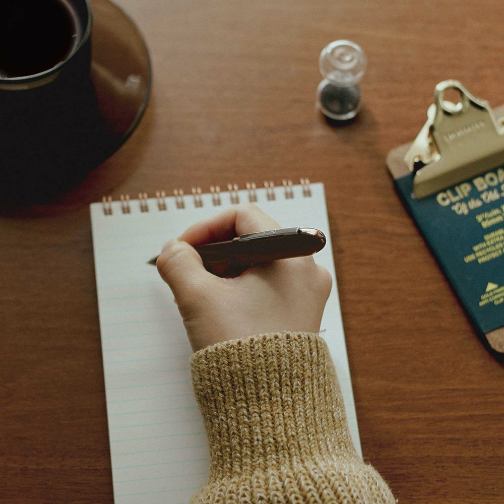Penco Bullet Ballpoint Pen Light Clear Brown compact Japanese bullet-style pen.