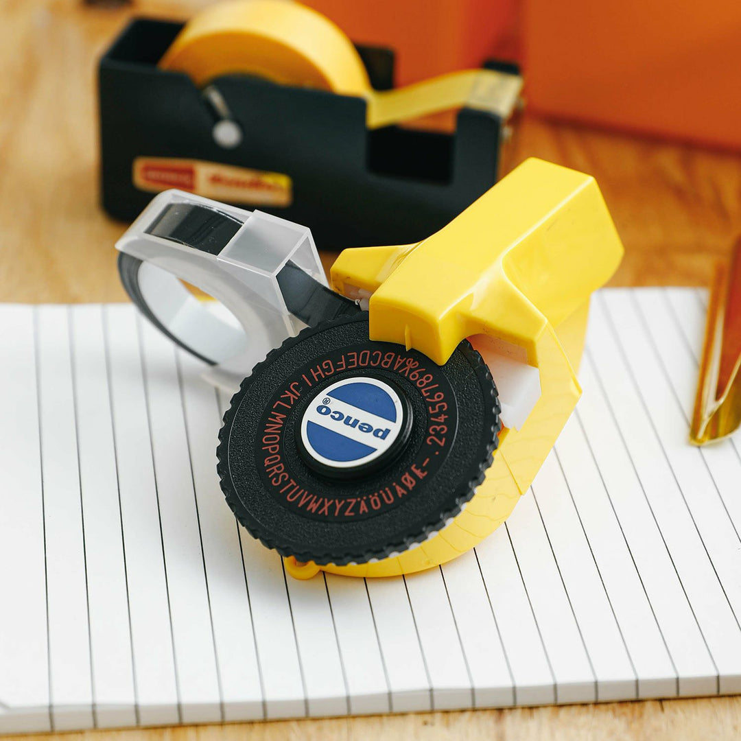 Penco Tape Writer – Yellow label maker by Hightide with retro design and black embossed tape.