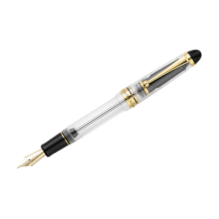 Pilot Custom 823 Fountain Pen in fully transparent clear resin with gold trim and 14K gold nib, featuring a high-capacity vacuum-filling system – perfect for showcasing ink flow and craftsmanship.