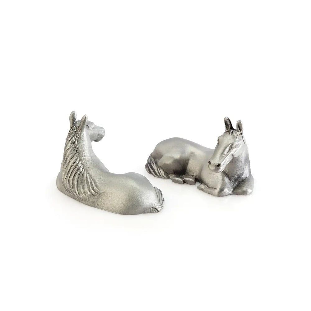Pair of pewter horse-shaped chopstick rests, each sculpted in a calm reclining pose, symbolizing strength in stillness and adding an elegant zodiac touch to any dining table.