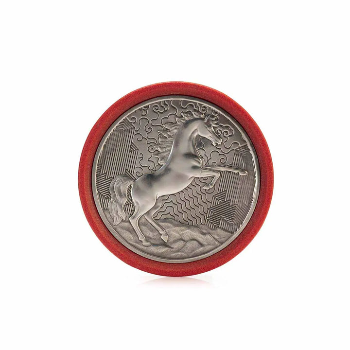 Round pewter coaster with a raised design of a rearing horse, set against a red eco-composite base—symbolizing vitality, energy, and progress for the Year of the Horse.
