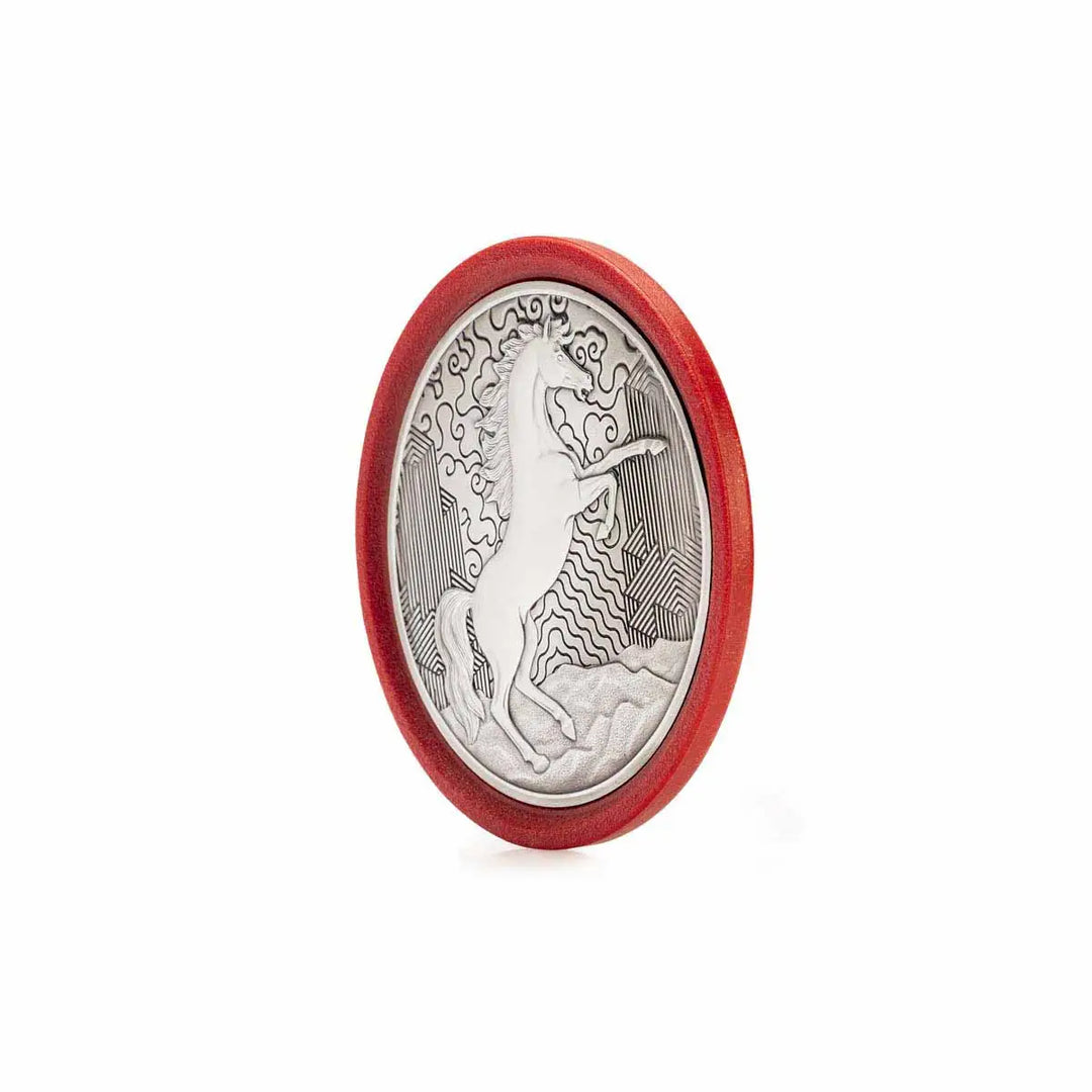 Round pewter coaster with a raised design of a rearing horse, set against a red eco-composite base—symbolizing vitality, energy, and progress for the Year of the Horse.