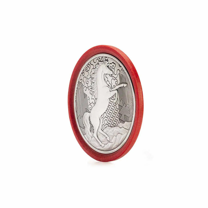 Round pewter coaster with a raised design of a rearing horse, set against a red eco-composite base—symbolizing vitality, energy, and progress for the Year of the Horse.