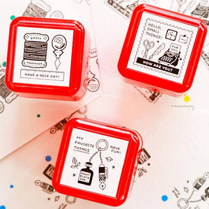 Eric Small Things Pre-Inked Stamp by Sanby Japan, compact black-ink stamp for journaling and planner decoration.