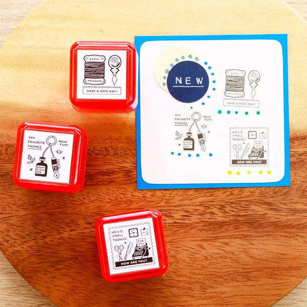 Load image into Gallery viewer, Eric Small Things Pre-Inked Stamps by Sanby Japan, compact black-ink stamps for journaling and planner decoration.
