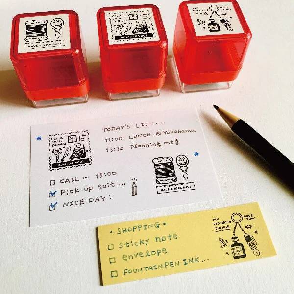 Eric Small Things Pre-Inked Stamp by Sanby Japan, compact black-ink stamp for journaling and planner decoration.