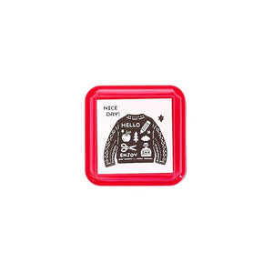 Sanby x Eric Small Things Pre-Inked Stamp – Sweater, compact Japanese pre-inked stamp with black ink for creative journaling and stationery use.
