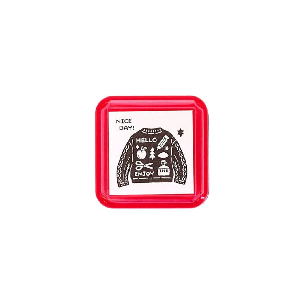 Sanby x Eric Small Things Pre-Inked Stamp – Sweater, compact Japanese pre-inked stamp with black ink for creative journaling and stationery use.