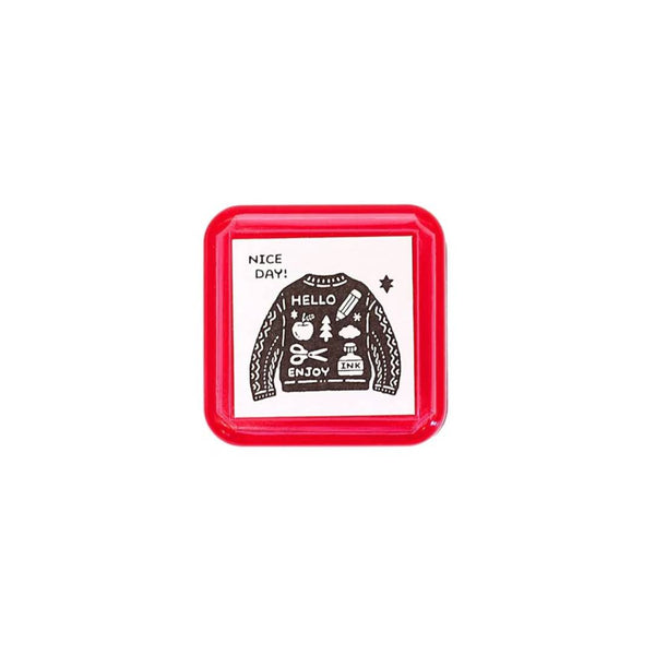 Load image into Gallery viewer, Sanby x Eric Small Things Pre-Inked Stamp – Sweater, compact Japanese pre-inked stamp with black ink for creative journaling and stationery use.
