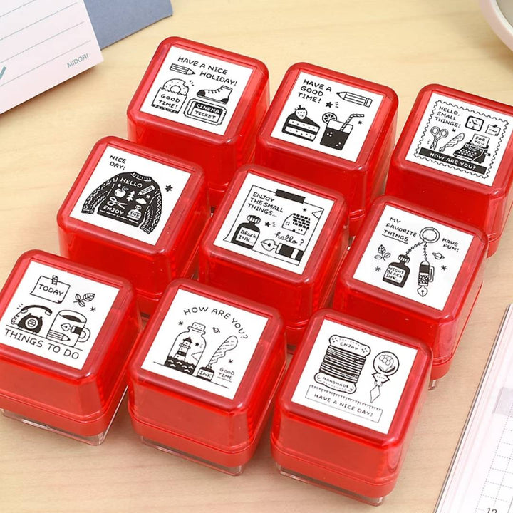 Eric Small Things Pre-Inked Stamp by Sanby Japan, compact black-ink stamp for journaling and planner decoration.