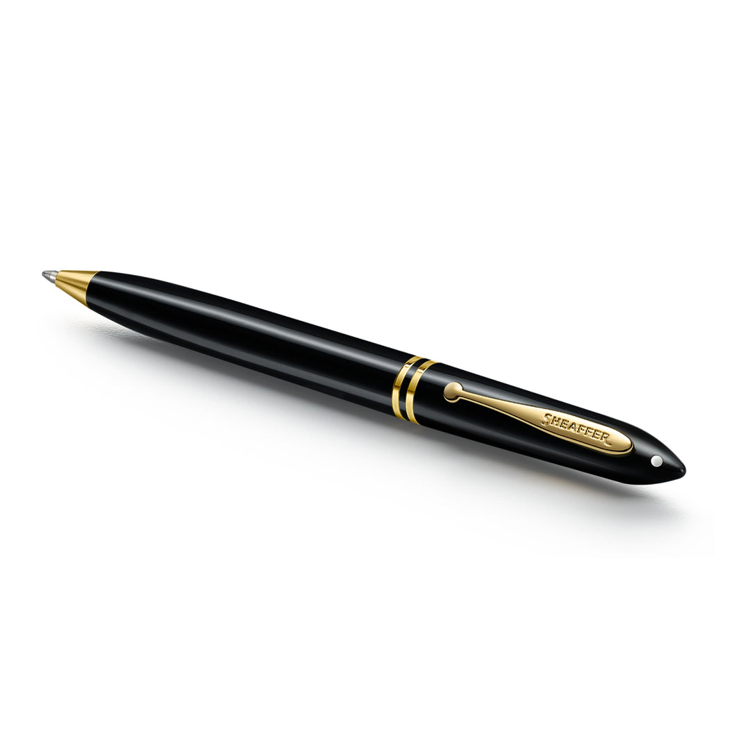 Sheaffer Balance III E893 ballpoint pen lying at an angle, gold tip and centre bands
