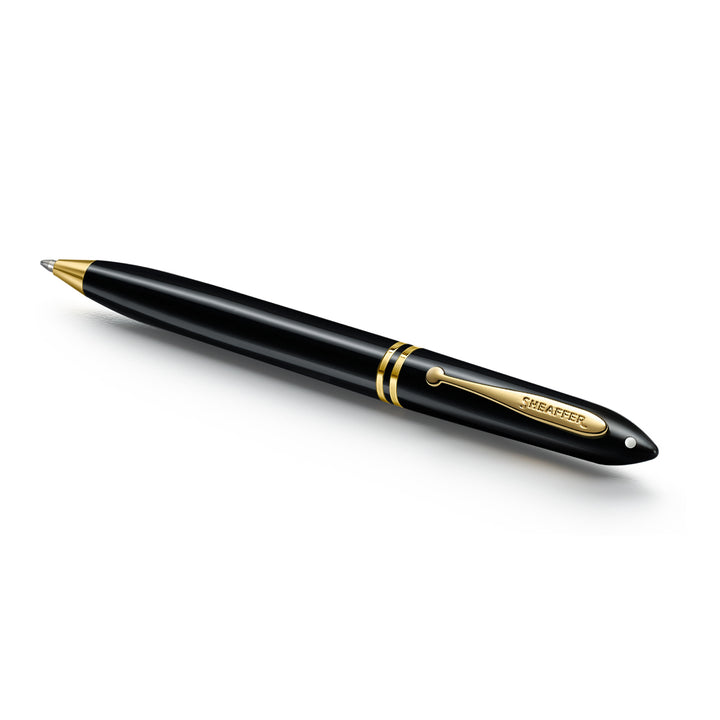 Sheaffer Balance III E893 ballpoint pen lying at an angle, gold tip and centre bands