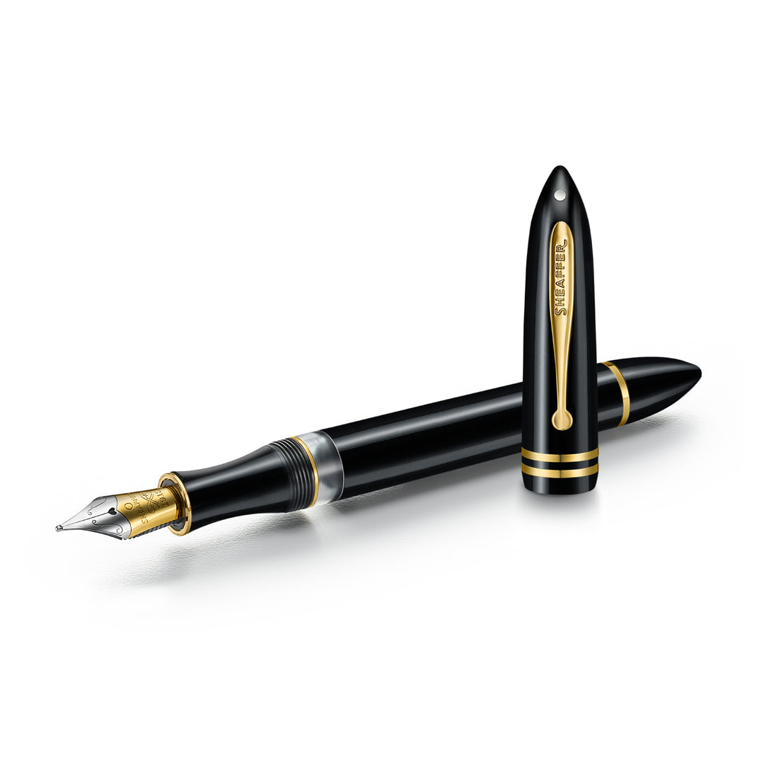 Sheaffer Balance III E893 fountain pen uncapped beside its cap, showing the gold Sheaffer-engraved clip