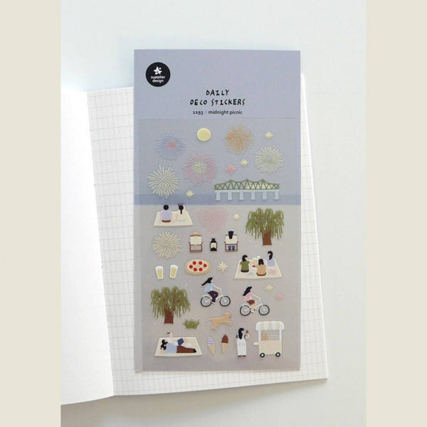 Load image into Gallery viewer, A sheet of decorative stickers featuring illustrations of fireworks, picnic blankets, pizza, drinks, people cycling, dogs, ice cream, and night sky scenes—perfect for journaling and capturing the atmosphere of a summer midnight picnic.
