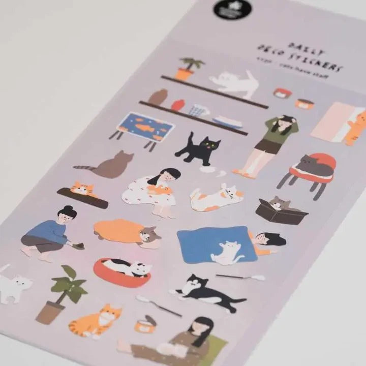 Close-up of Suatelier Cats Have Staff stickers showing cats and household items