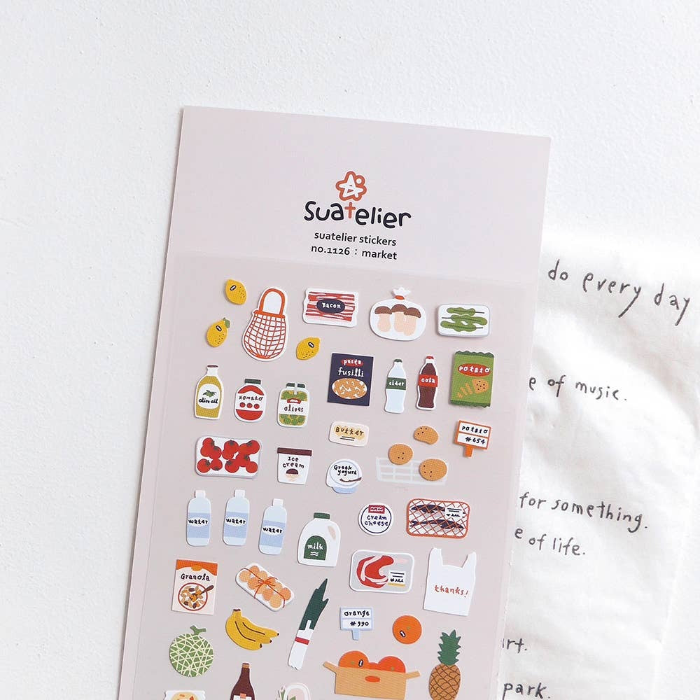 Suatelier Daily Deco Stickers Market sheet with grocery stickers, photographed at an angle