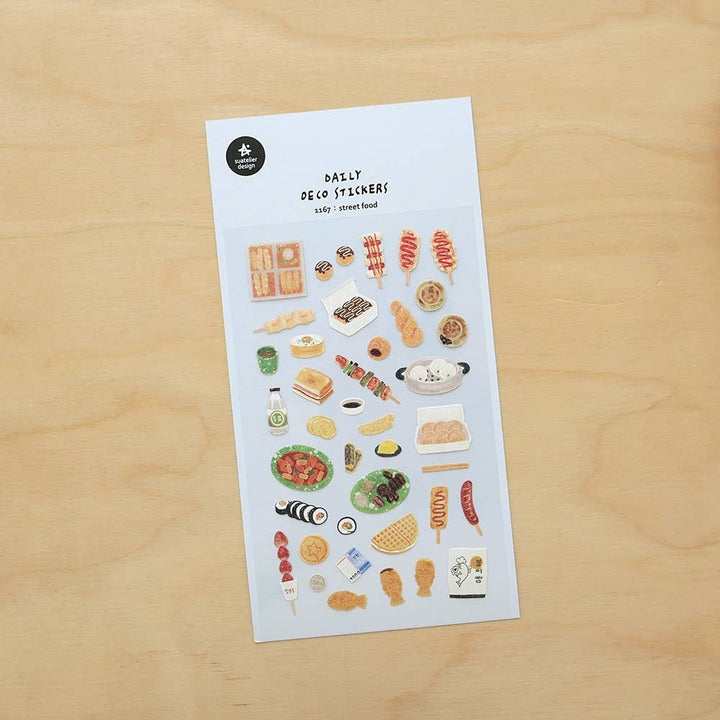 Suatelier Daily Deco Stickers Street Food sheet photographed on a wooden surface