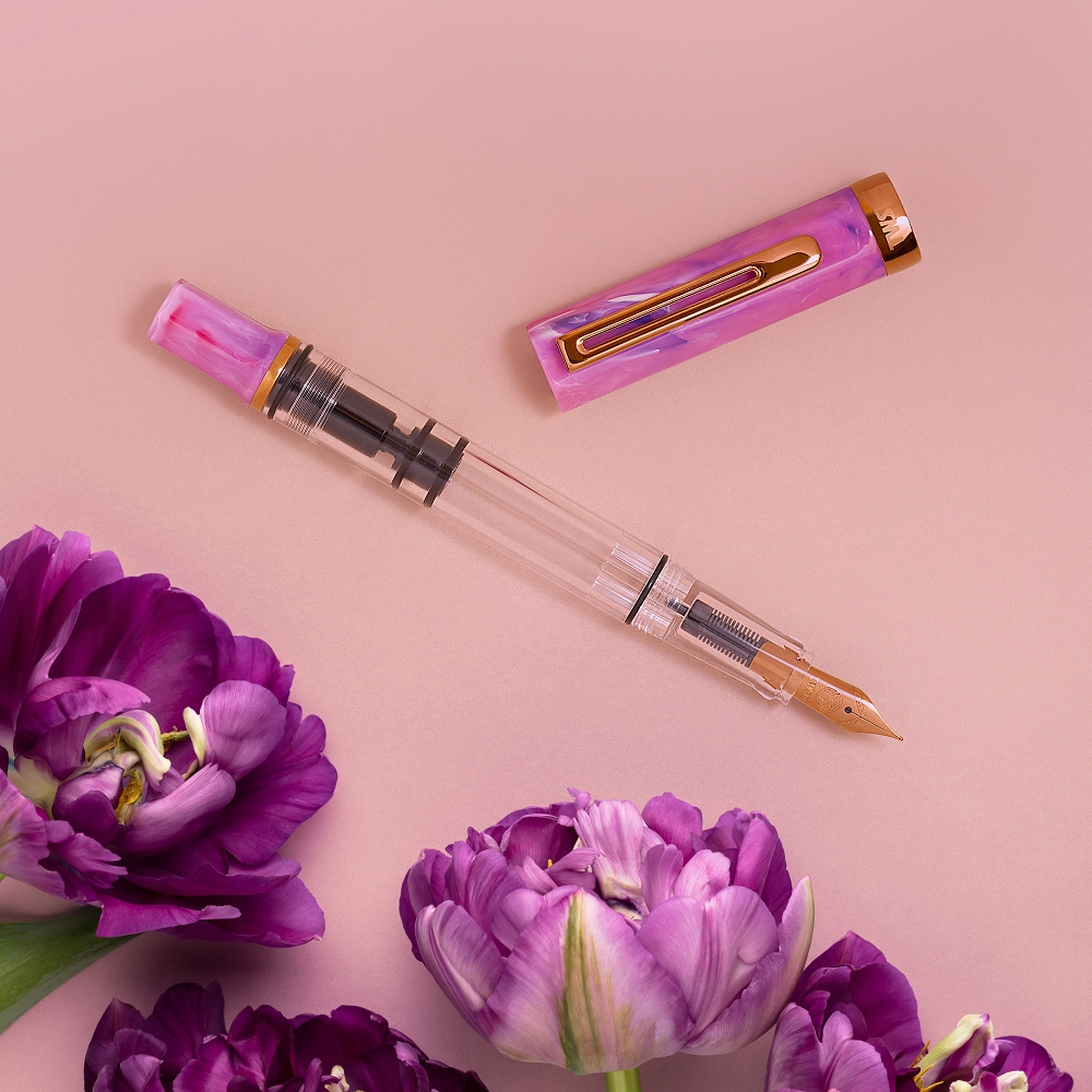 TWSBI ECO Fluorite Purple with Bronze Fountain Pen — writing at an angle