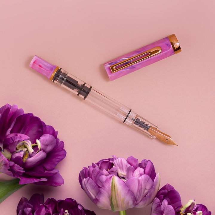 TWSBI ECO Fluorite Purple with Bronze Fountain Pen — writing at an angle
