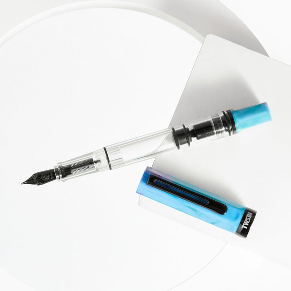 将图片加载到图库查看器，TWSBI ECO Fountain Pen Blue with Onyx cap and accents, transparent barrel, piston filler design.
