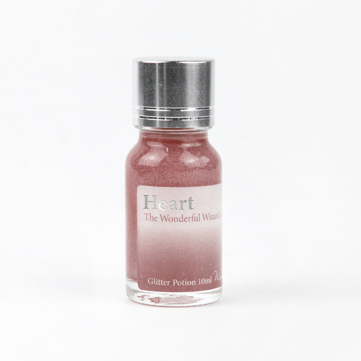 Wearingeul Heart (Wizard of Oz) Glitter Potion 10ml bottle with rose gold and silver glitter on a white background