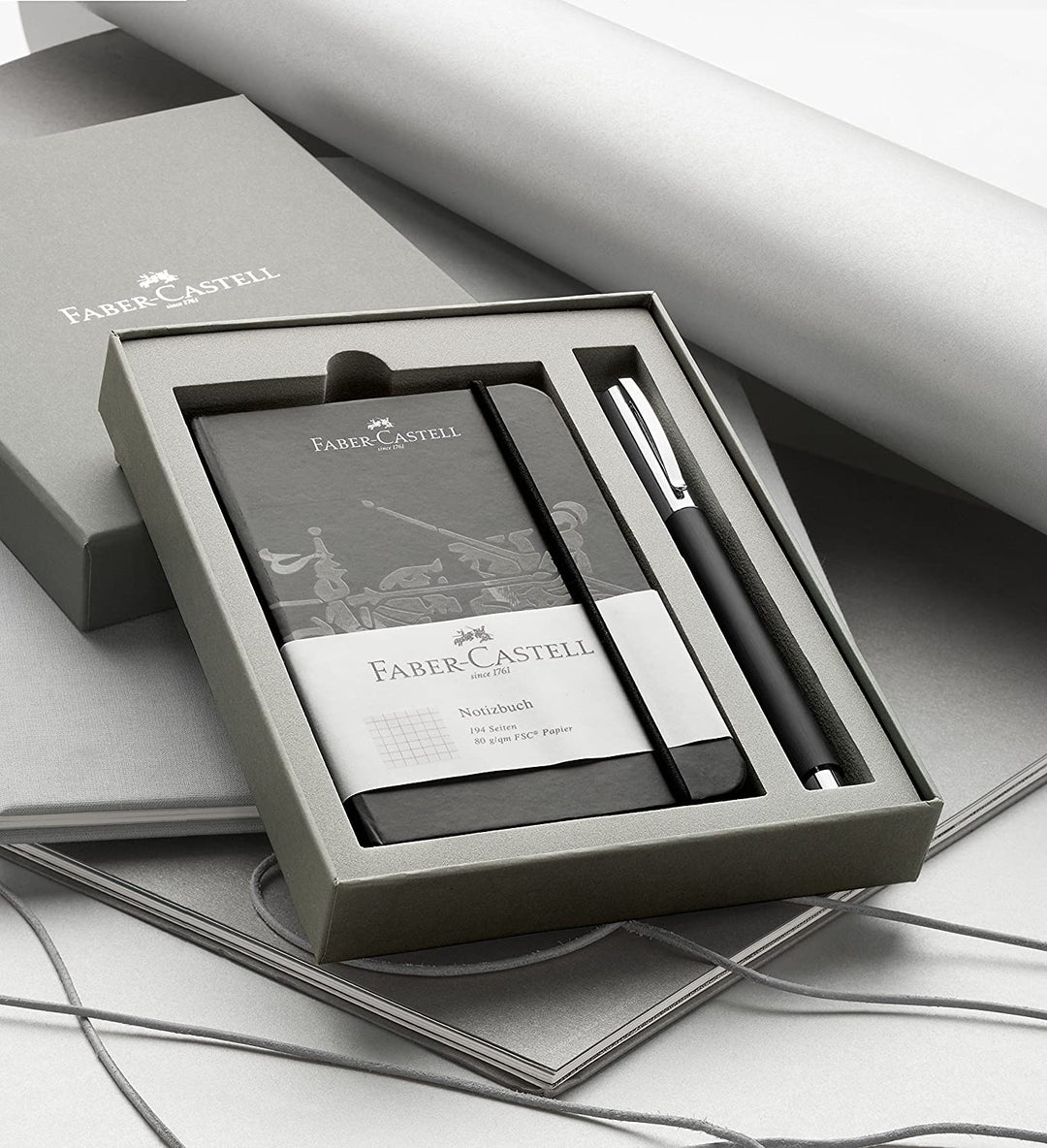Faber-Castell Ambition Resin Ballpoint Pen Black Promo Set With Notebook — uncapped with cap posted