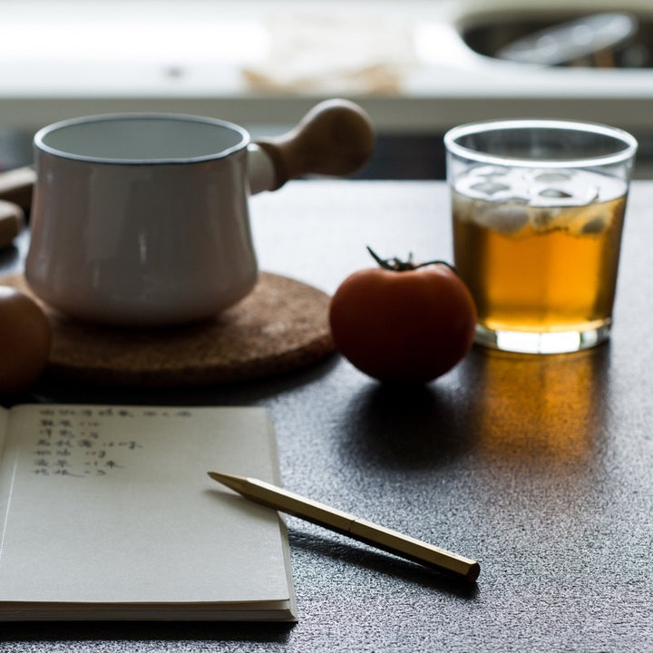 Ystudio Classic Revolve-Slim Ballpoint Pen - Brass — writing at an angle