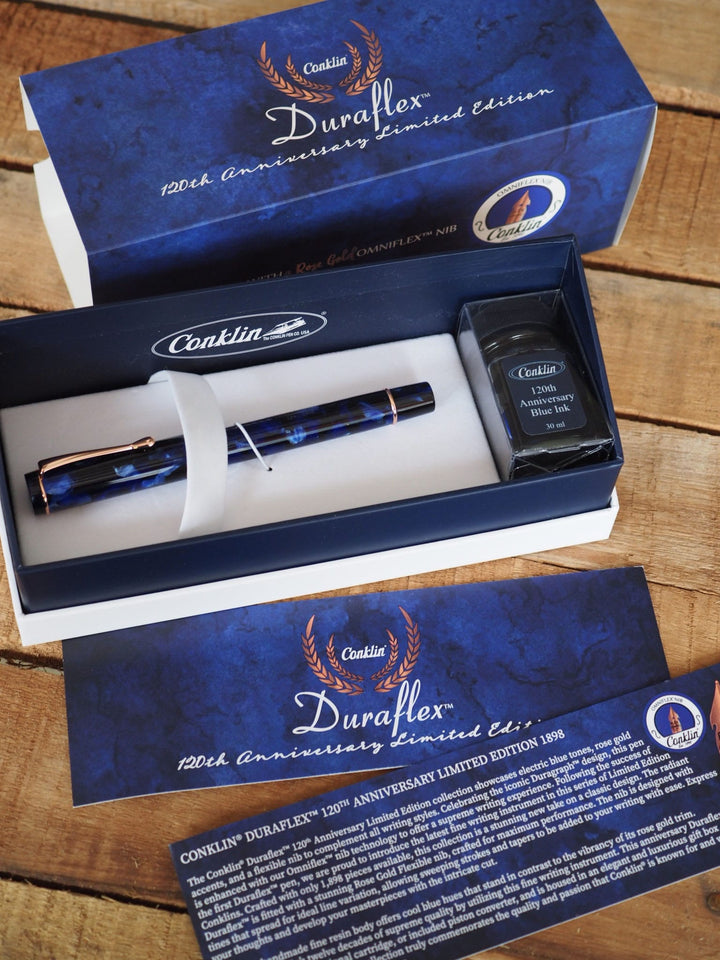 Conklin Duraflex 120th Anniversary Fountain Pen (Rose Gold Flex Nib) — flat lay