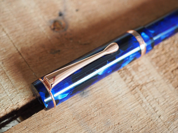 Conklin Duraflex 120th Anniversary Fountain Pen (Rose Gold Flex Nib) — flat lay