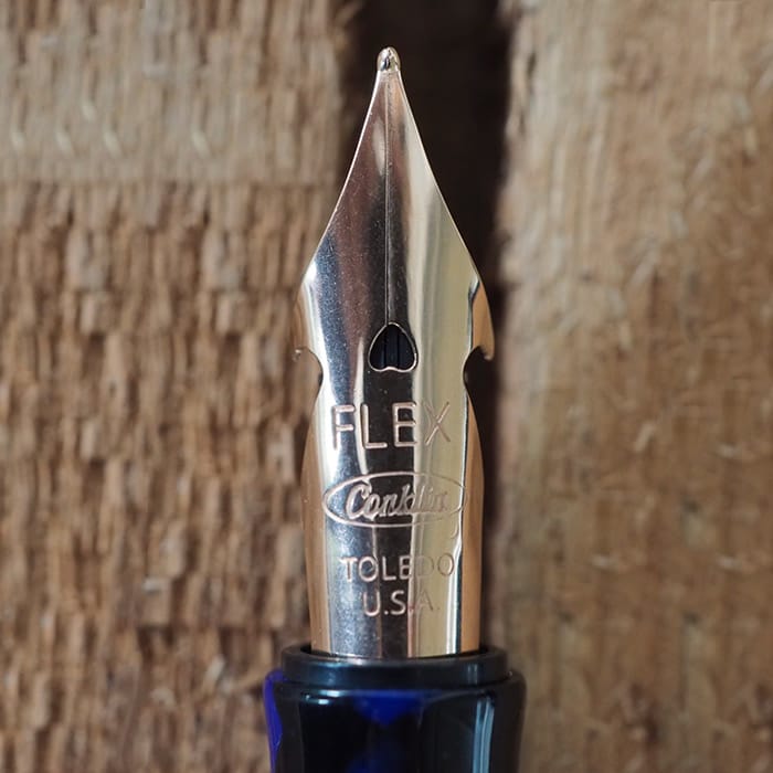 Conklin Duraflex 120th Anniversary Fountain Pen (Rose Gold Flex Nib) — flat lay