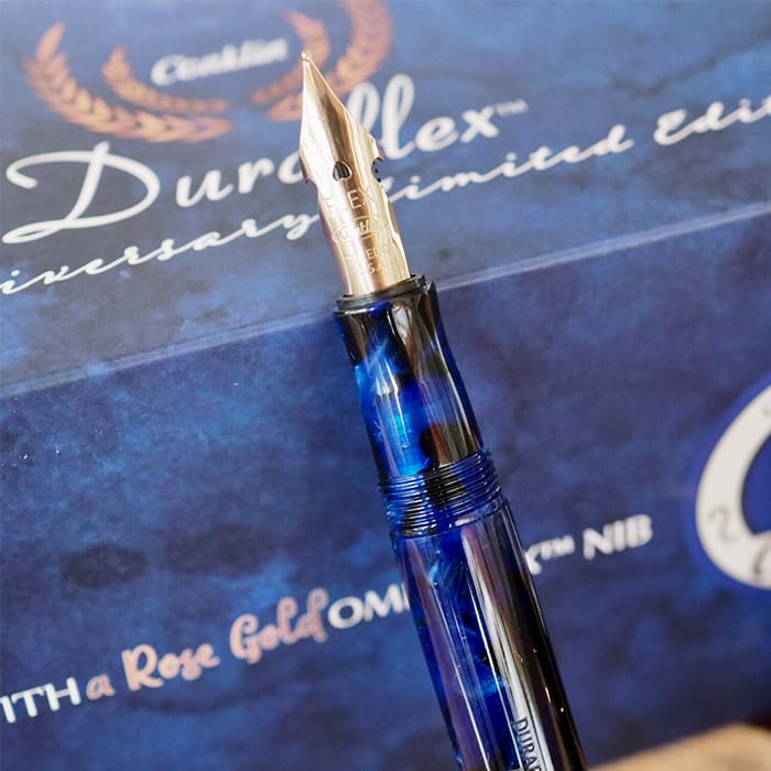 Conklin Duraflex 120th Anniversary Fountain Pen (Rose Gold Flex Nib) — flat lay