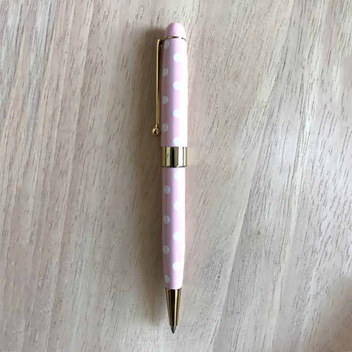 Helen Kelly Dotti Pen Pink — writing at an angle